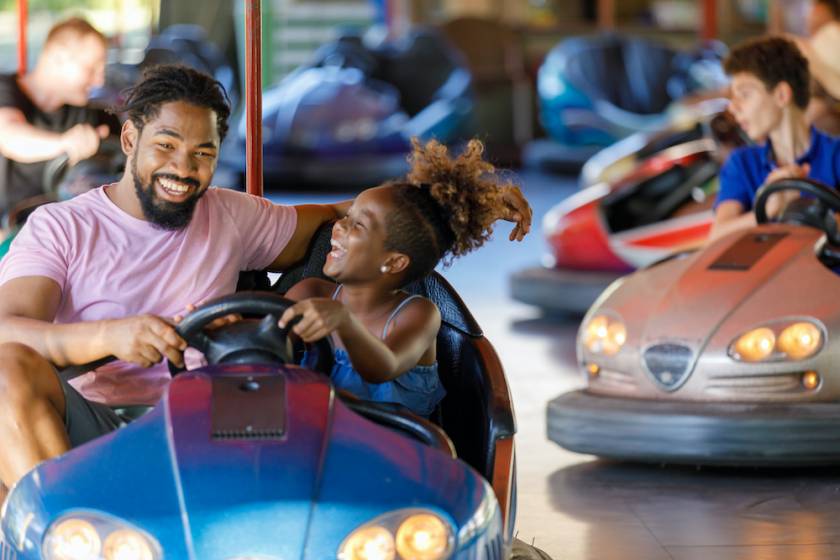 father daughter bumper cars 