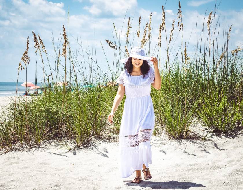 person walking on beach